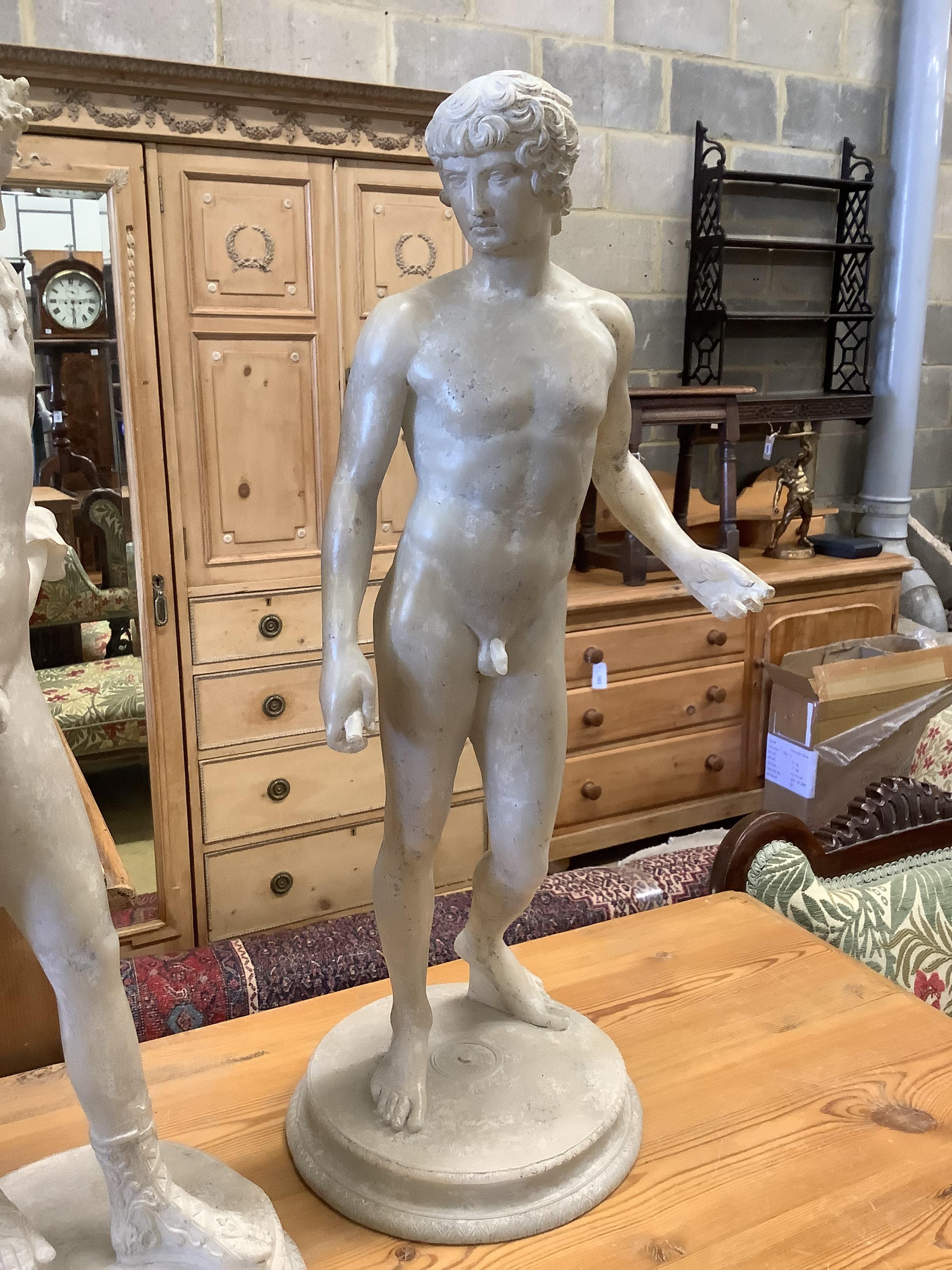 A pair of faux marble classical figures, larger 62cm high